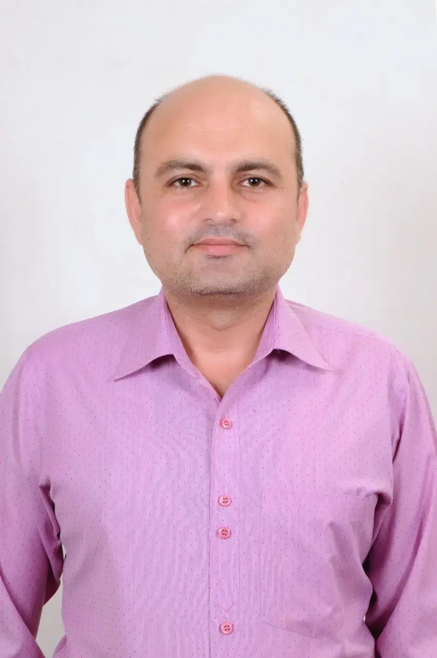 Dr. Krishan Tuli